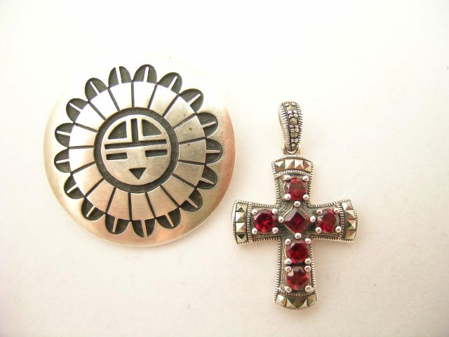 Appraisal: Two sterling silver jewelry pieces including marcasite and garnet cross