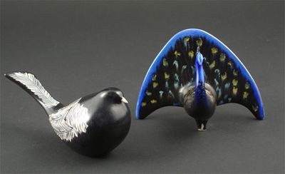 Appraisal: A Beswick Colin Melbourne figure of a Peacock painted in