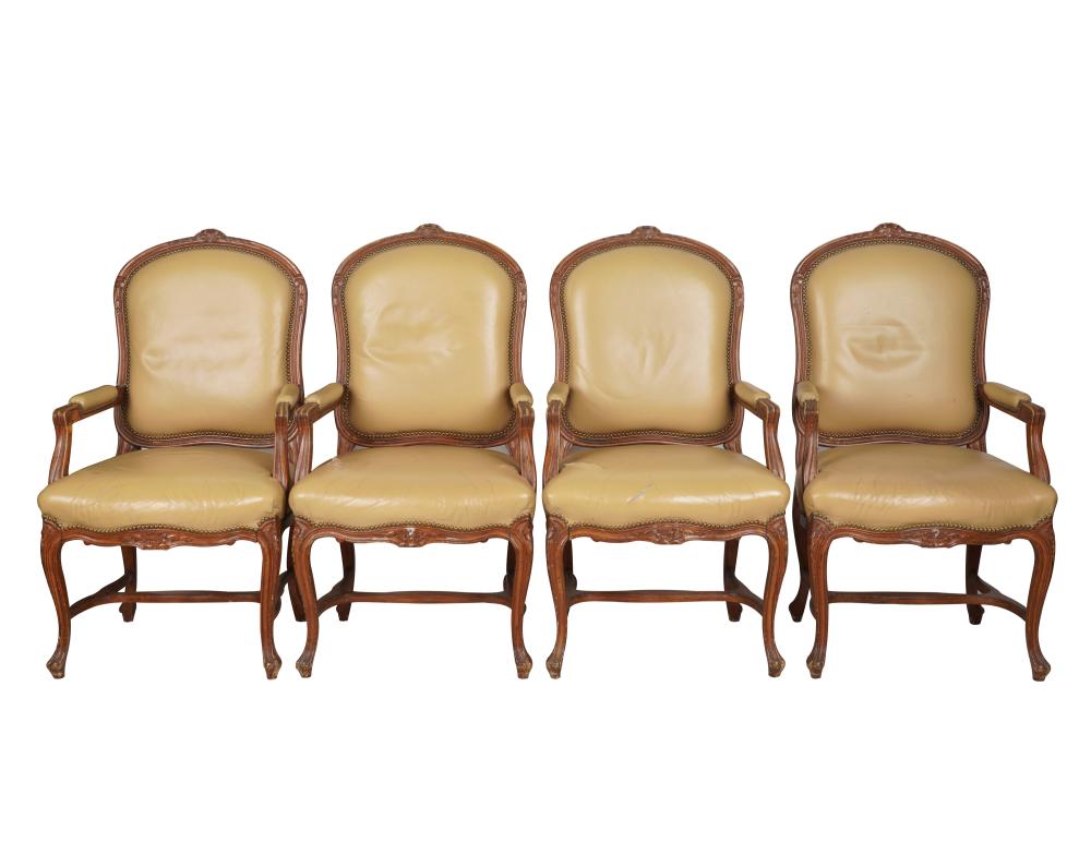 Appraisal: SET OF FOUR ROCOCO-STYLE CARVED WOOD ARMCHAIRSafter covered with tan