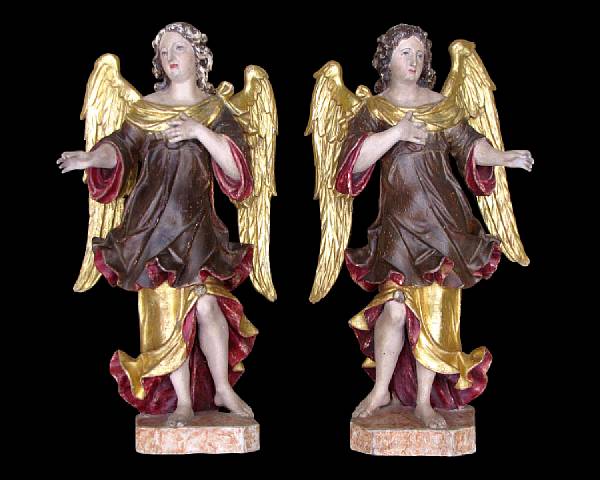 Appraisal: A pair of Italian Baroque style parcel gilt and polychrome