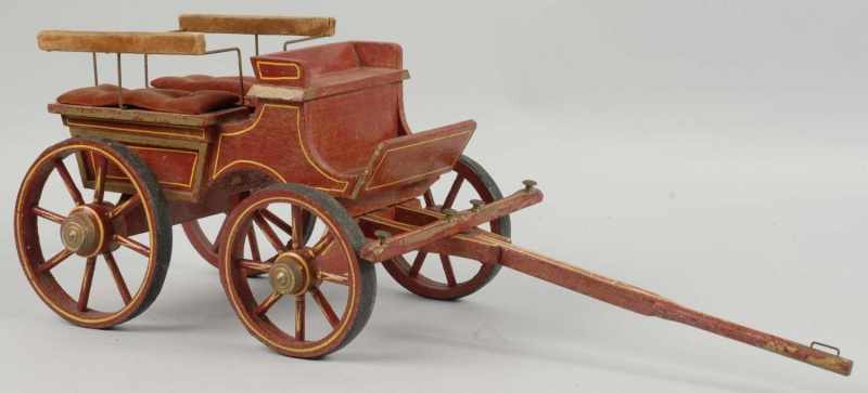 Appraisal: Wooden Pull Cart Toy Description Spoked wheels original pull bar