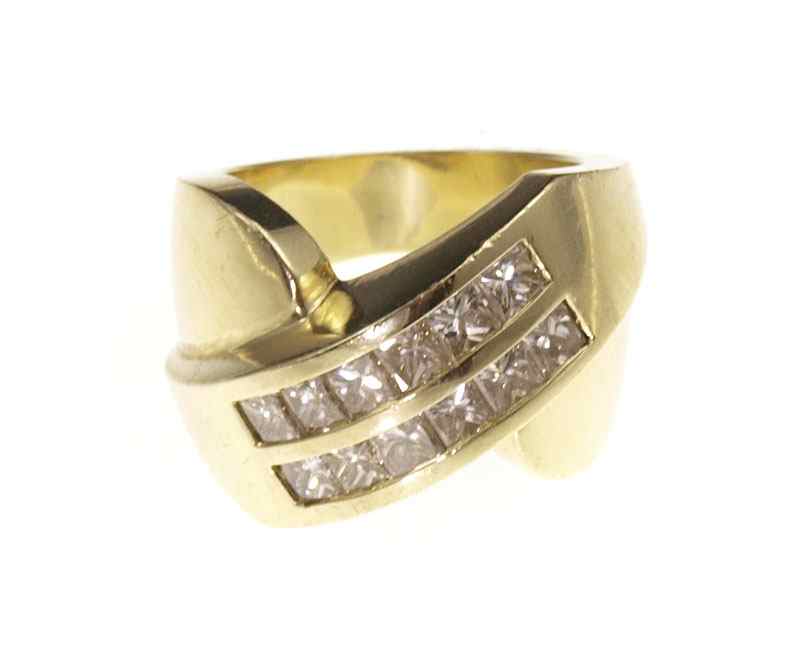 Appraisal: CTW DIAMOND FASHION RING K yellow gold ring contains twelve