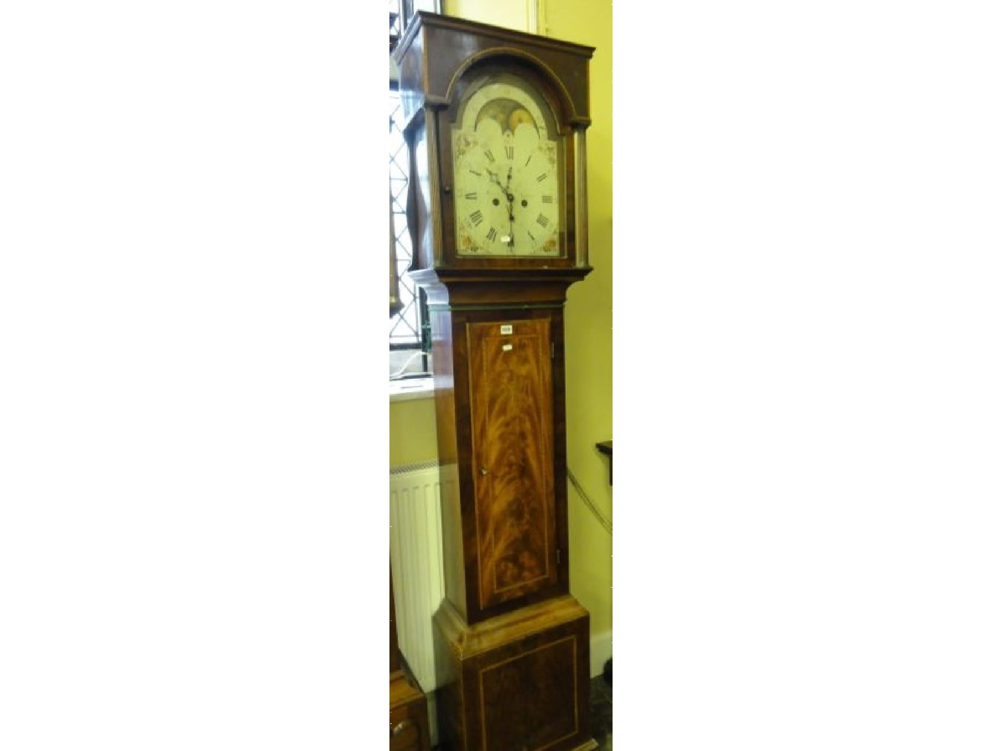 Appraisal: A Georgian mahogany longcase clock with broken arch painted dial