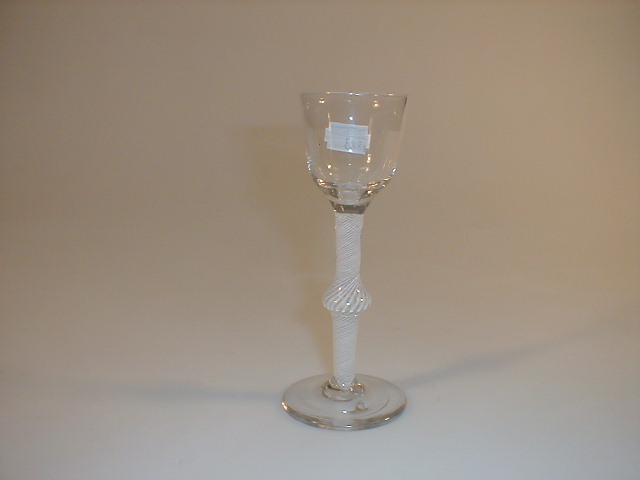 Appraisal: An thC wine glass with a plain ogee bowl over