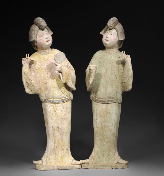 Appraisal: TWO TANG POTTERY COURT LADIES Pair superbly modeled finely detailed