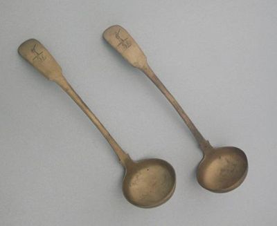 Appraisal: A pair of th century silvergilt toddy ladles crested and