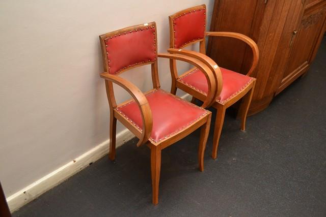 Appraisal: A PAIR OF FRENCH OAK CHAIRS WITH RED VINYL UPHOLSTERY