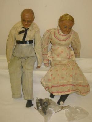 Appraisal: A pair of wax dolls modelled as an old woman