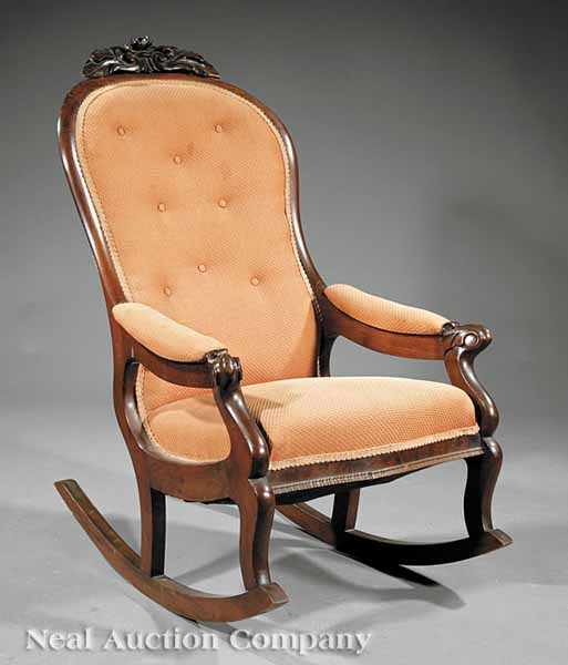 Appraisal: An American Rococo Mahogany Rocking Chair mid- th c floral