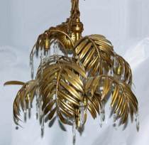 Appraisal: A Gilt Palm Chandelier th Century Nine palm branches extend