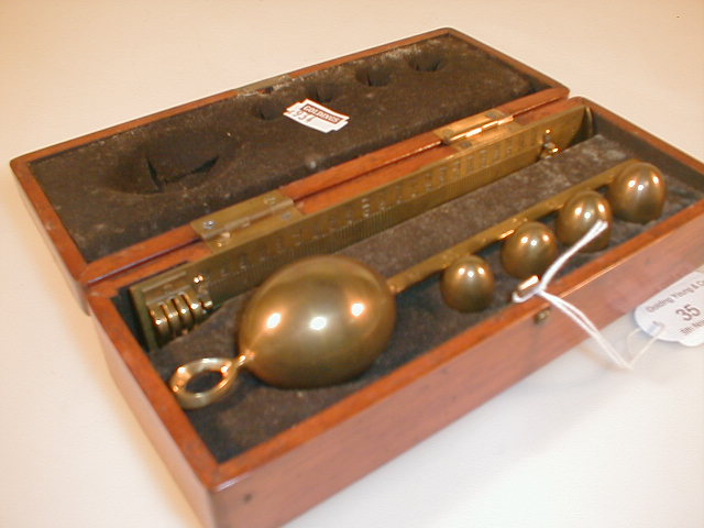 Appraisal: A mahogany cased Bates sacharometer