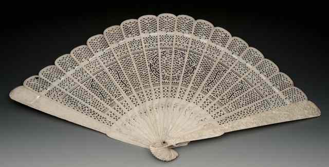 Appraisal: A CHINESE CANTON FOLDING FAN with intricate pierced decoration and