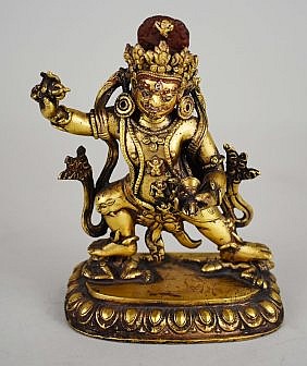 Appraisal: SINO-TIBETAN GILT BRONZE DEMON DEITY th th Century The elaborately