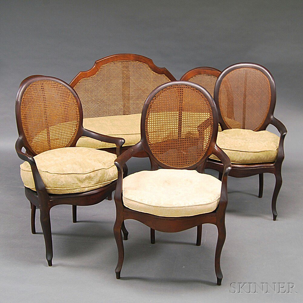 Appraisal: French Walnut Caned Settee and Three Fauteuil late th century