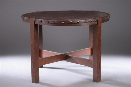 Appraisal: MISSION LEATHER AND OAK CENTER TABLE early th century Leather-mounted