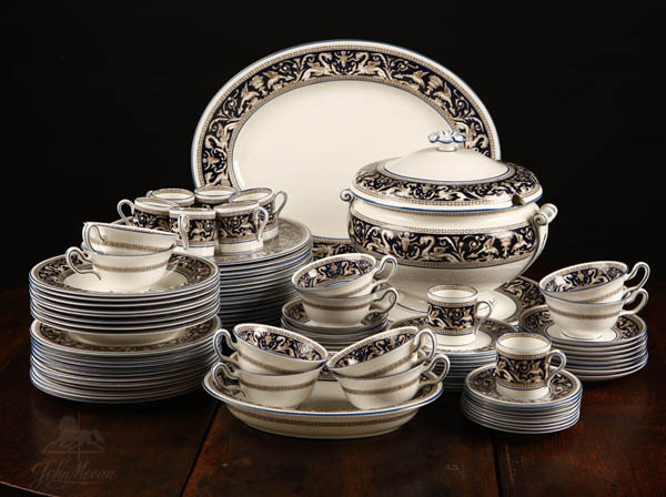 Appraisal: A Wedgwood 'Florentine' pattern dinner service A Wedgwood 'Florentine' pattern