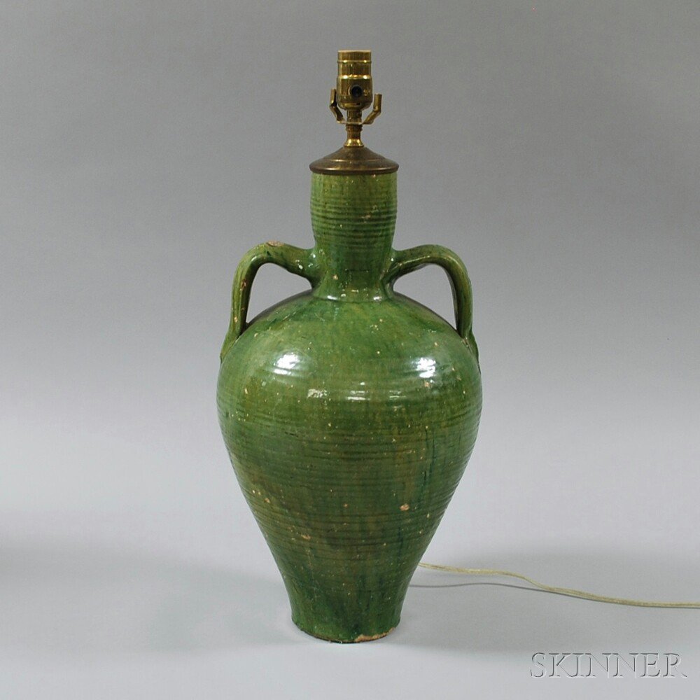 Appraisal: Green-glazed Pottery Jug Mounted as a Lamp with applied strap