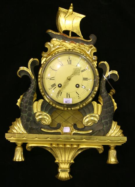 Appraisal: A Swedish th century Exacta gilt wood clock with convex