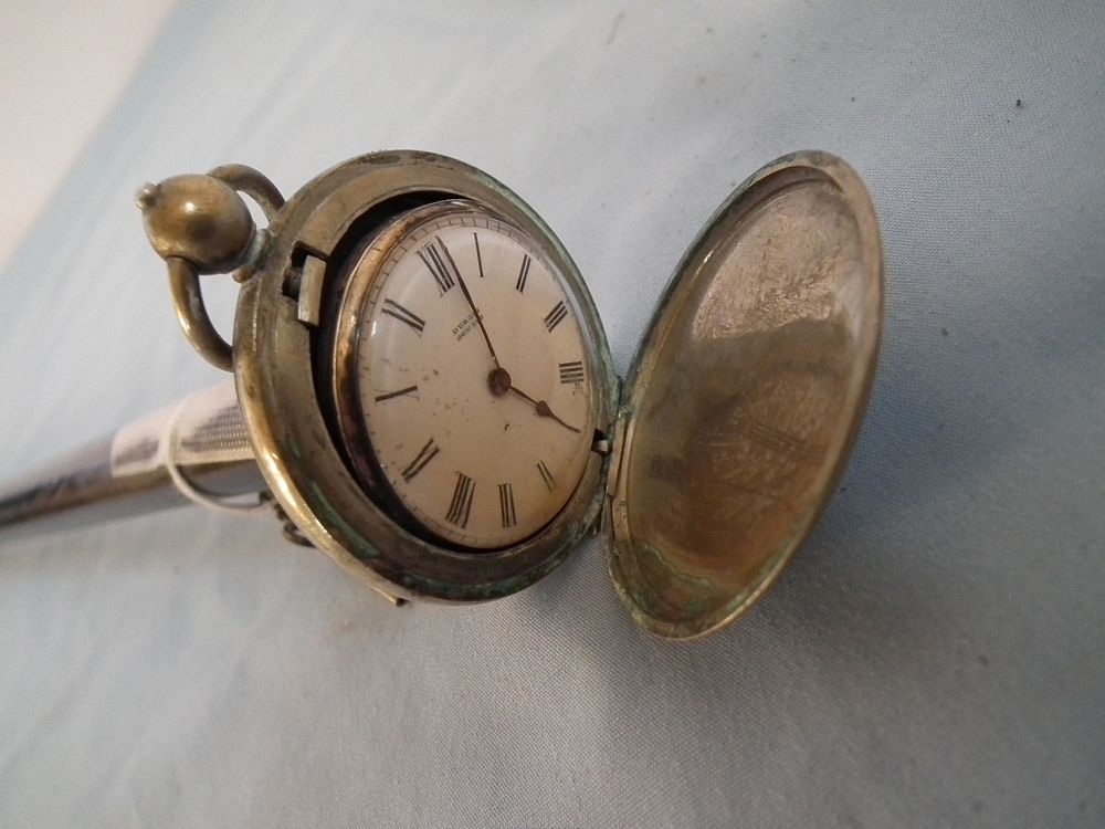 Appraisal: ANTIQUE POCKET WATCH CANE th century silver plated pocket watch