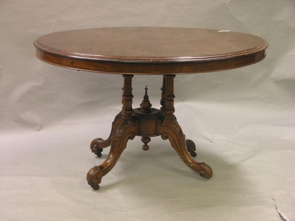 Appraisal: A Victorian mahogany pedestal dining table circular top tilting on