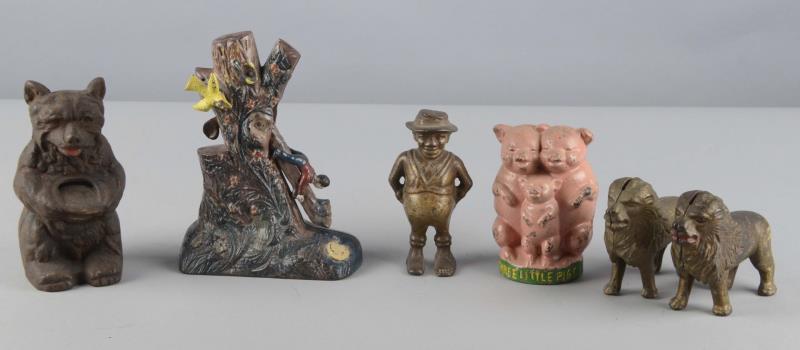 Appraisal: A Lot of Assorted Cast Iron Novelty Banks Including -