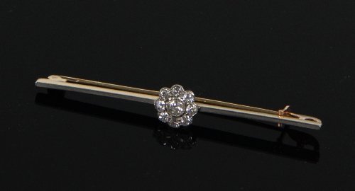 Appraisal: A bar brooch centred by a diamond cluster cm wide