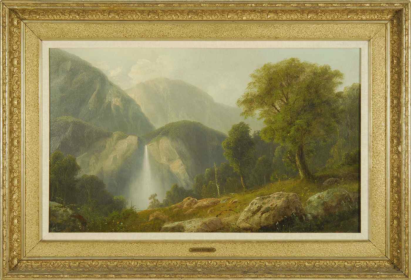 Appraisal: GEORGE GUNTHER HARTWICKAmerican d Expansive mountain landscape with waterfall Signed