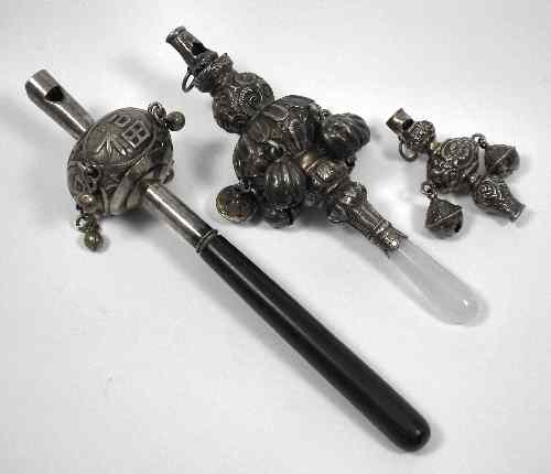 Appraisal: A Victorian silver baby's rattle with hardstone handle Birmingham ins