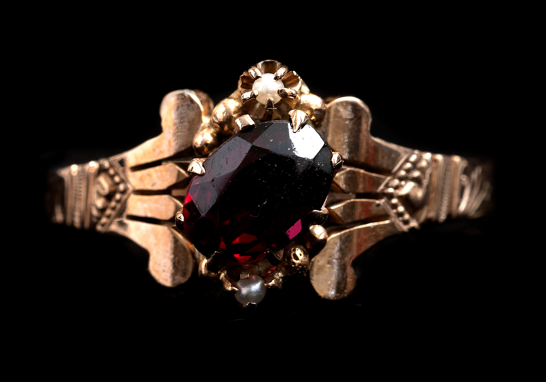 Appraisal: ROSE GOLD RED AMETHYST AND PEARL RING With central prong-set