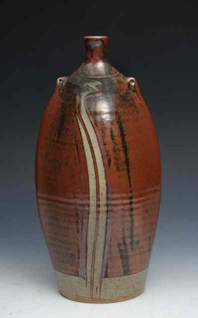 Appraisal: John Jelfs British b A tall stoneware bottle with lug