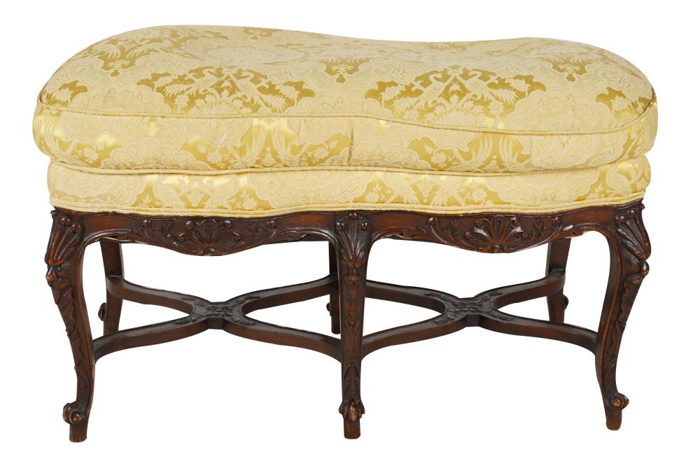 Appraisal: ROCOCO STYLE CARVED WALNUT BENCHwith attached yellow damask seat cushion