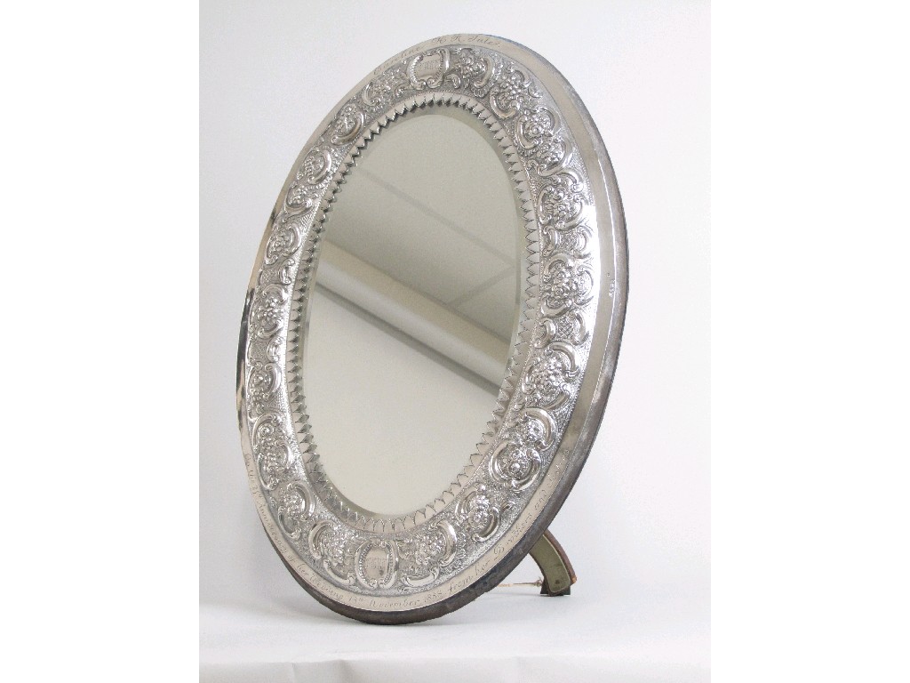 Appraisal: A George III oval Frame with later floral embossed decoration