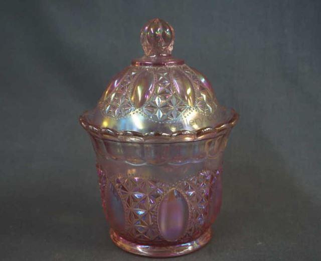 Appraisal: Imperial Pink Carnival Glass Covered Candy Jar Produced - by