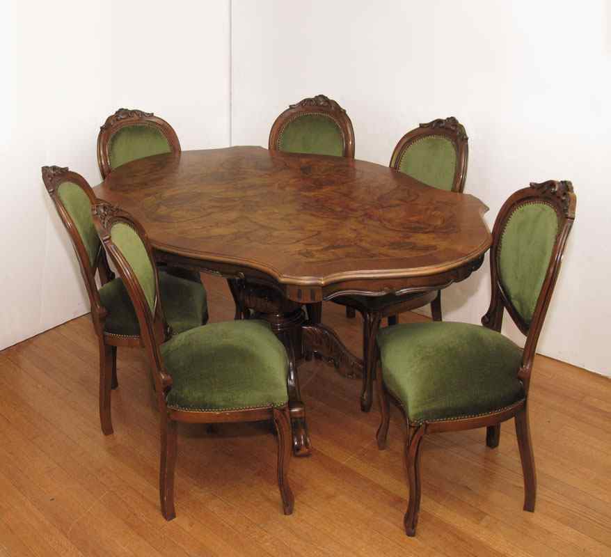 Appraisal: FRENCH STYLE BURL CARVED PEDESTAL TABLE AND CHAIRS Table with