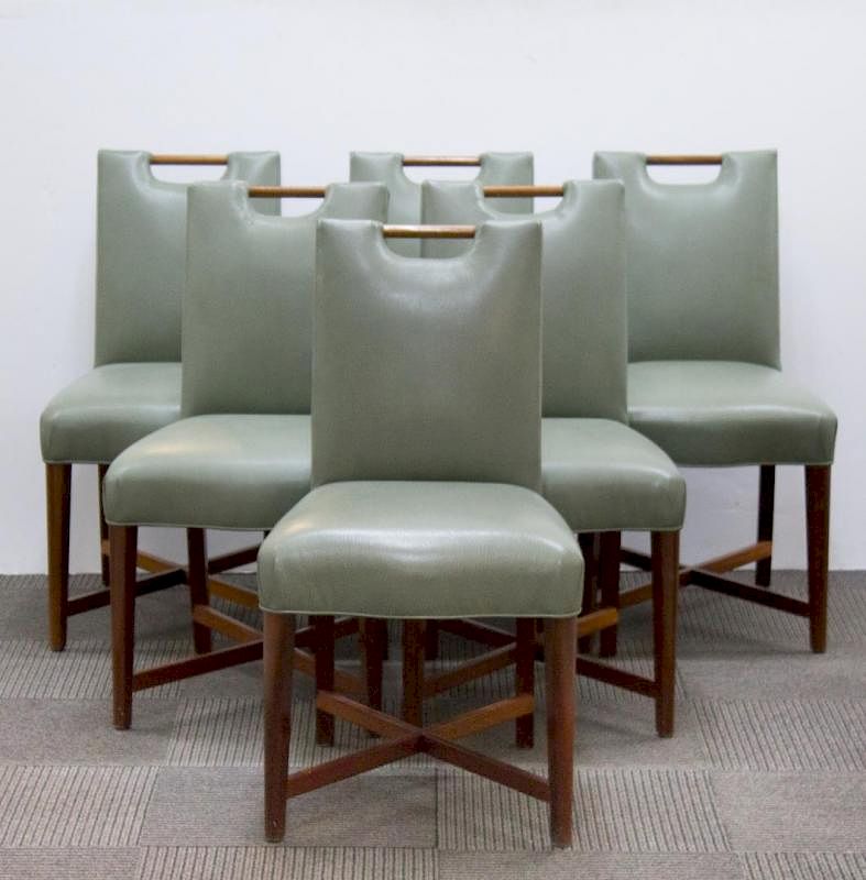 Appraisal: Mid-Century Modern Leather Side Chairs Mid-Century Modern side chairs with