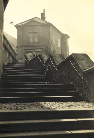 Appraisal: SUDEK JOSEF - Untitled child walking up steps Silver print