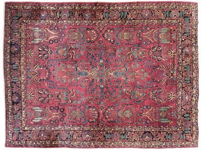 Appraisal: Sarouk rug repeating floral designs on burgundy field ft x