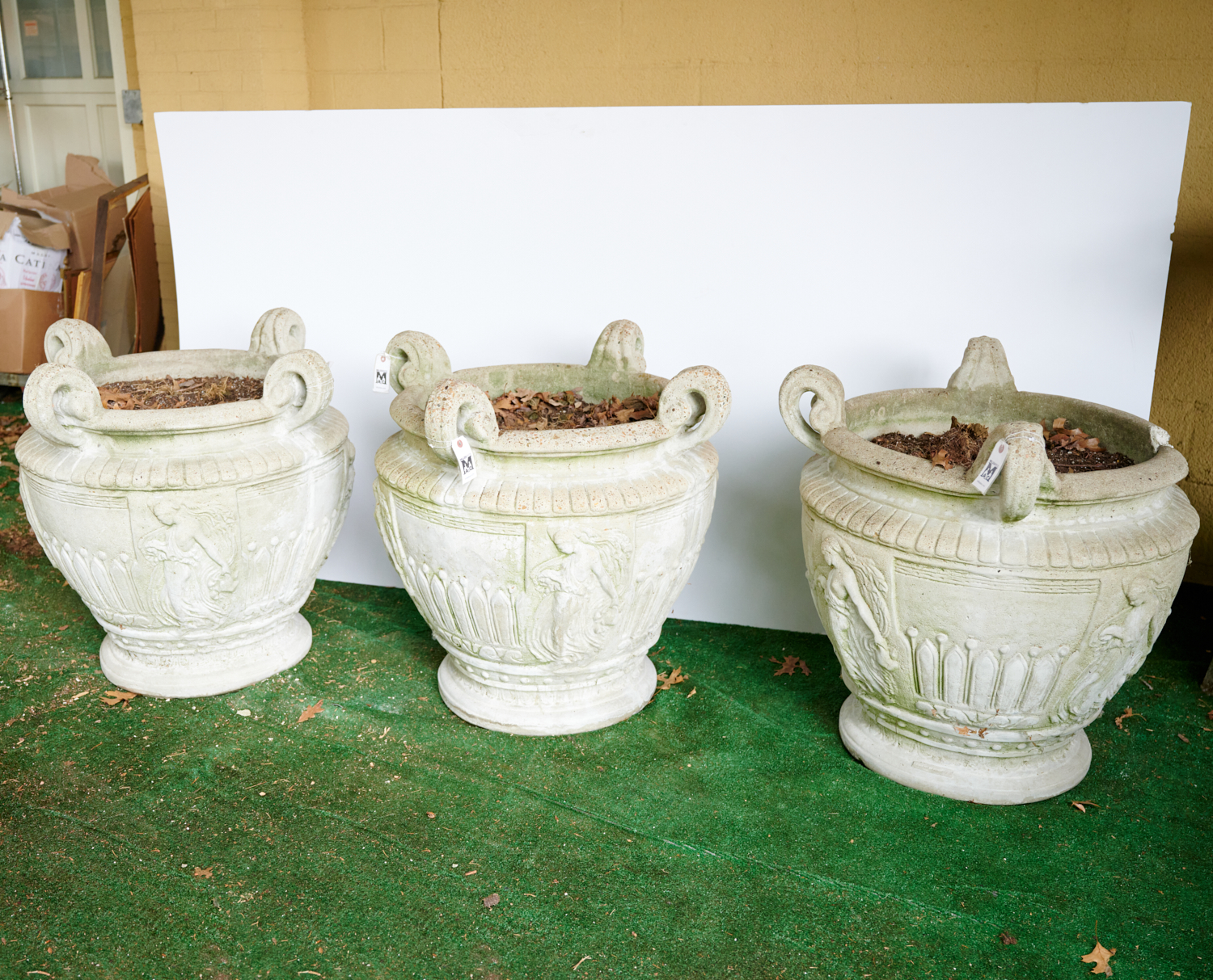 Appraisal: LARGE NEOCLASSICAL CAST STONE GARDEN URNS th c with panels