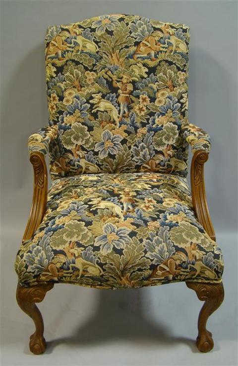 Appraisal: CHIPPENDALE STYLE NEEDLEPOINT UPHOLSTERY LOLLING CHAIR th century the slightly