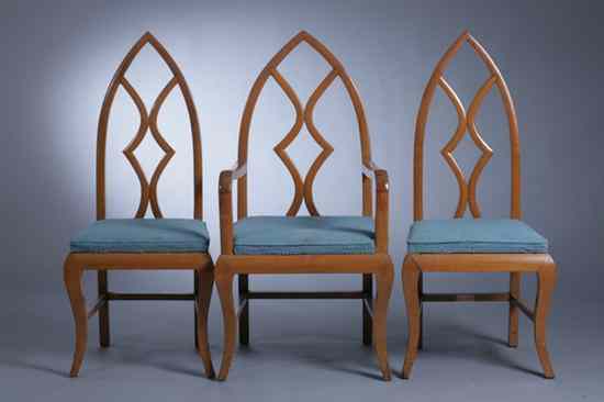 Appraisal: SET EIGHT BLOND WOOD ARCH-BACK DINING CHAIRS Including one open-arm