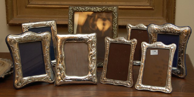 Appraisal: A COLLECTION OF EIGHT PICTURE FRAMES Comprising seven sterling silver