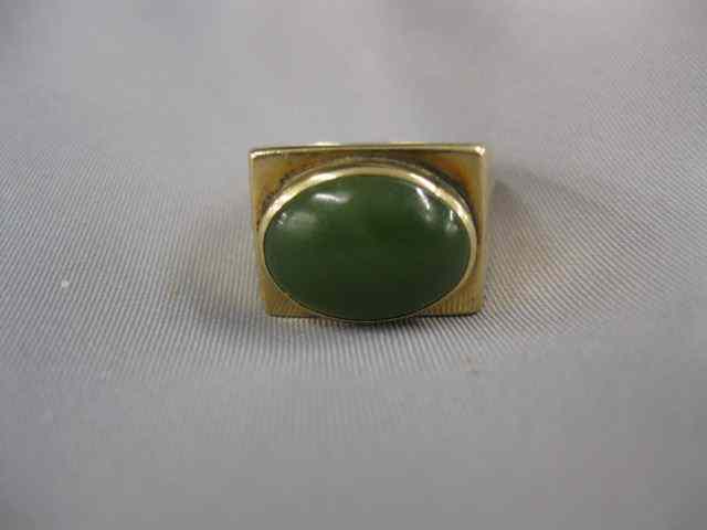 Appraisal: Jade Ring oval deep green cabachon in k yellow gold