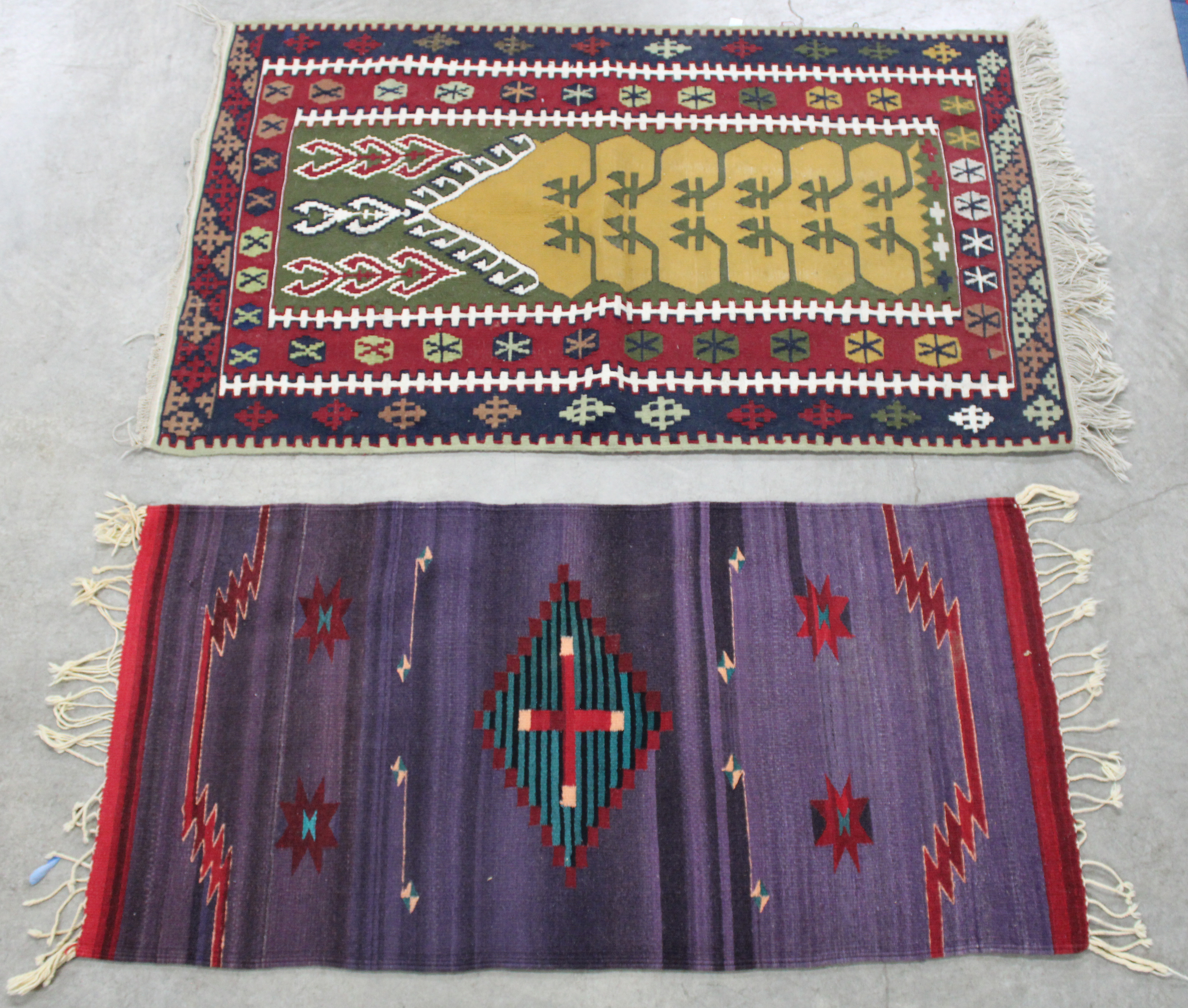 Appraisal: TWO ANTIQUE NAVAJO THROW RUGS Two Navajo throw rugs early