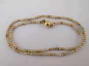 Appraisal: A seed pearl necklace with yellow metal tests carat gold