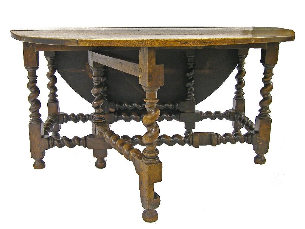 Appraisal: Good large th century oak gateleg dining table with bold