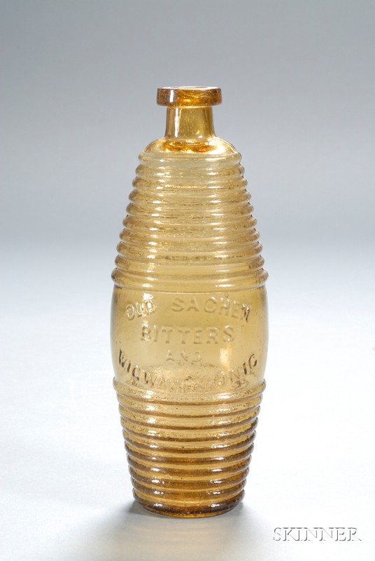 Appraisal: Old Sachem Yellow Glass Bitters Bottle America - ringed barrel