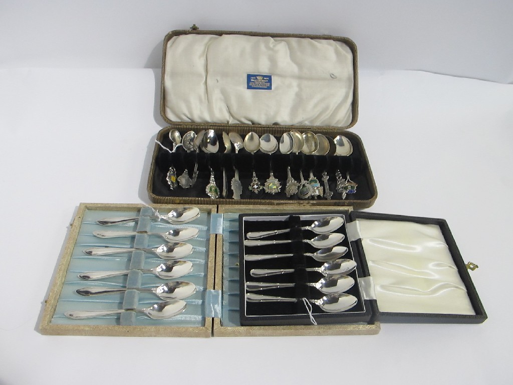 Appraisal: A lot comprising two cased sets of six silver spoons