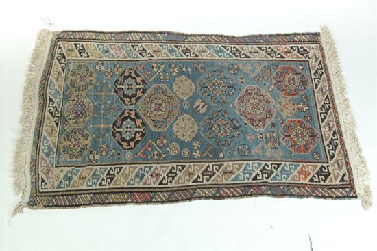 Appraisal: ORIENTAL RUG Caucasian Ivory border medium blue ground ' ''