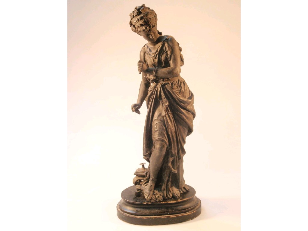 Appraisal: A thC cast spelter figure of a lady in classical