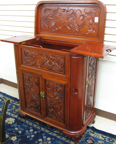 Appraisal: CARVED ROSEWOOD CABINET BAR Chinese th century The solid rosewood